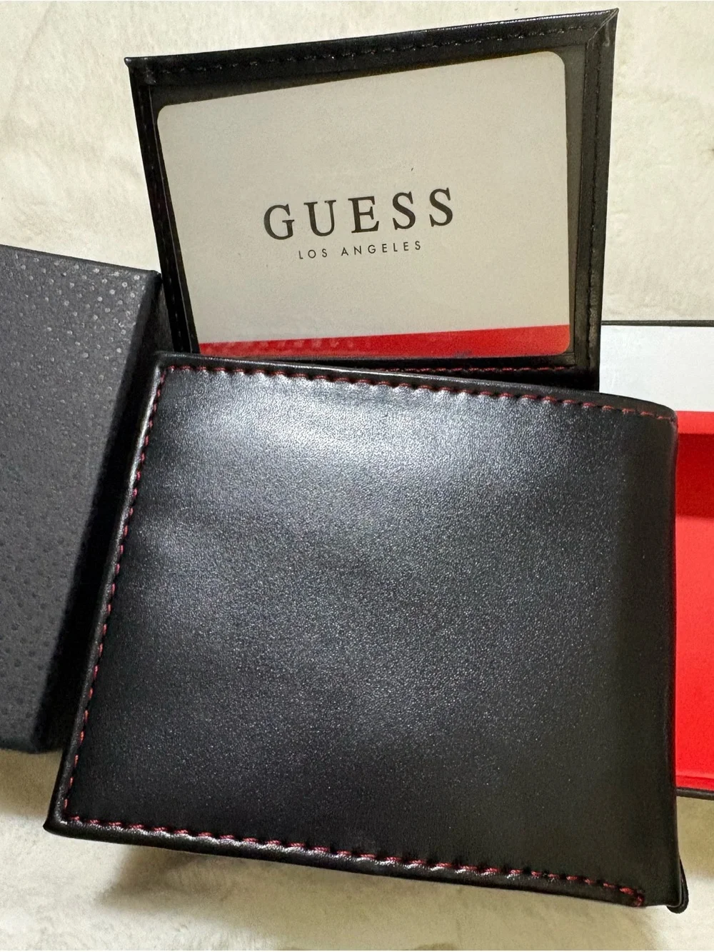 GUESS Black Leather Men's Wallet with Red Stitch Accents